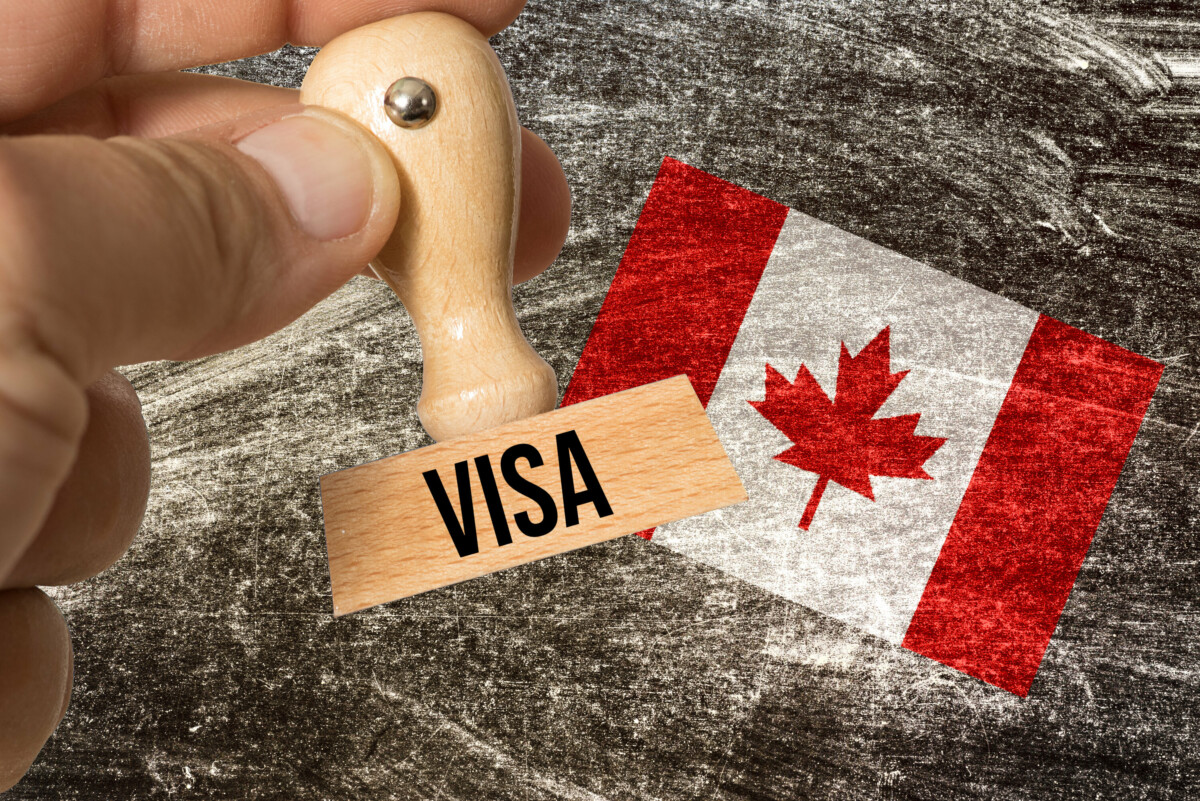 Flag of Canada and stamp visa